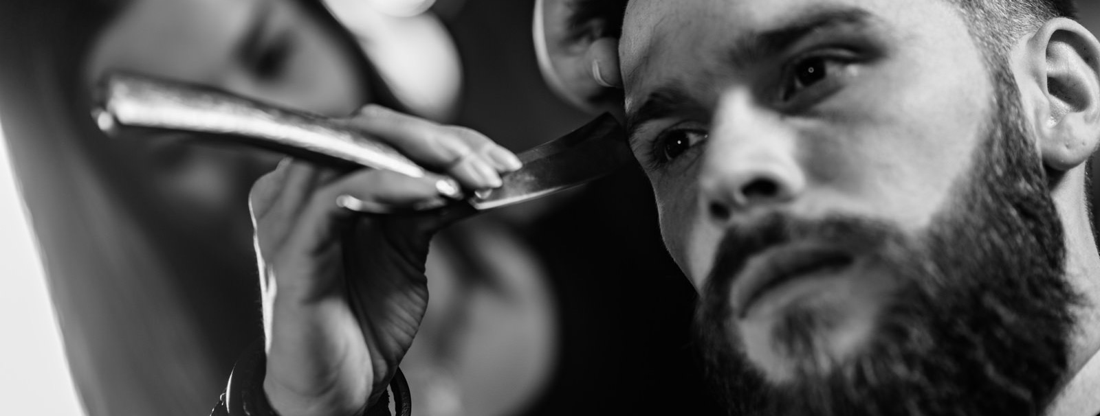 Man getting a hair cut at Tocco Divino Salon in Stockton, CA