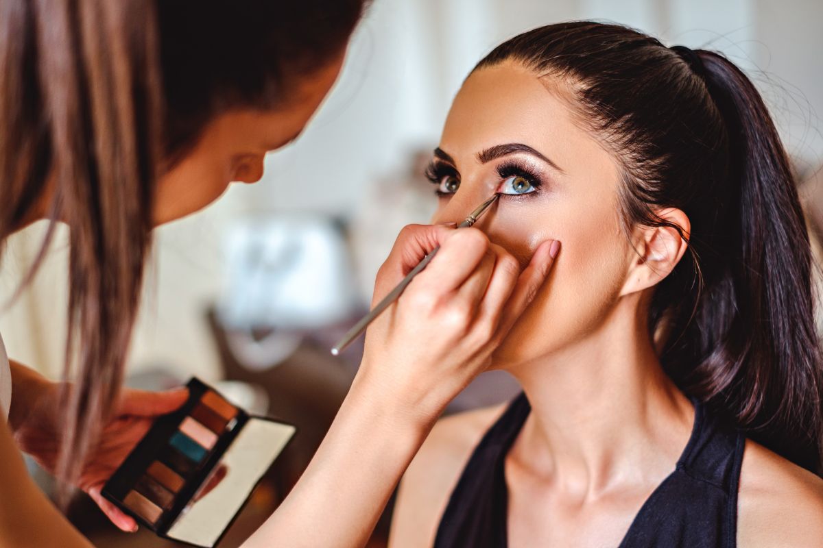 Makeup artist applying eyeshadow