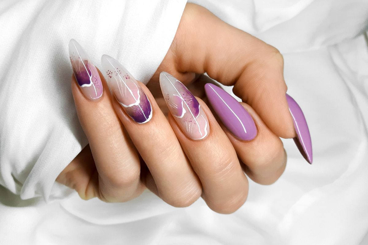 Almond-shaped nails with lavender nail art